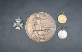 Two World War I medals including a Victory medal and The British War Medal issued to 194104 GNR. J .