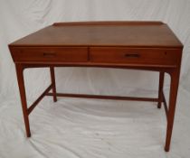 A mid-20th century teak desk designed by Svend Madsen,