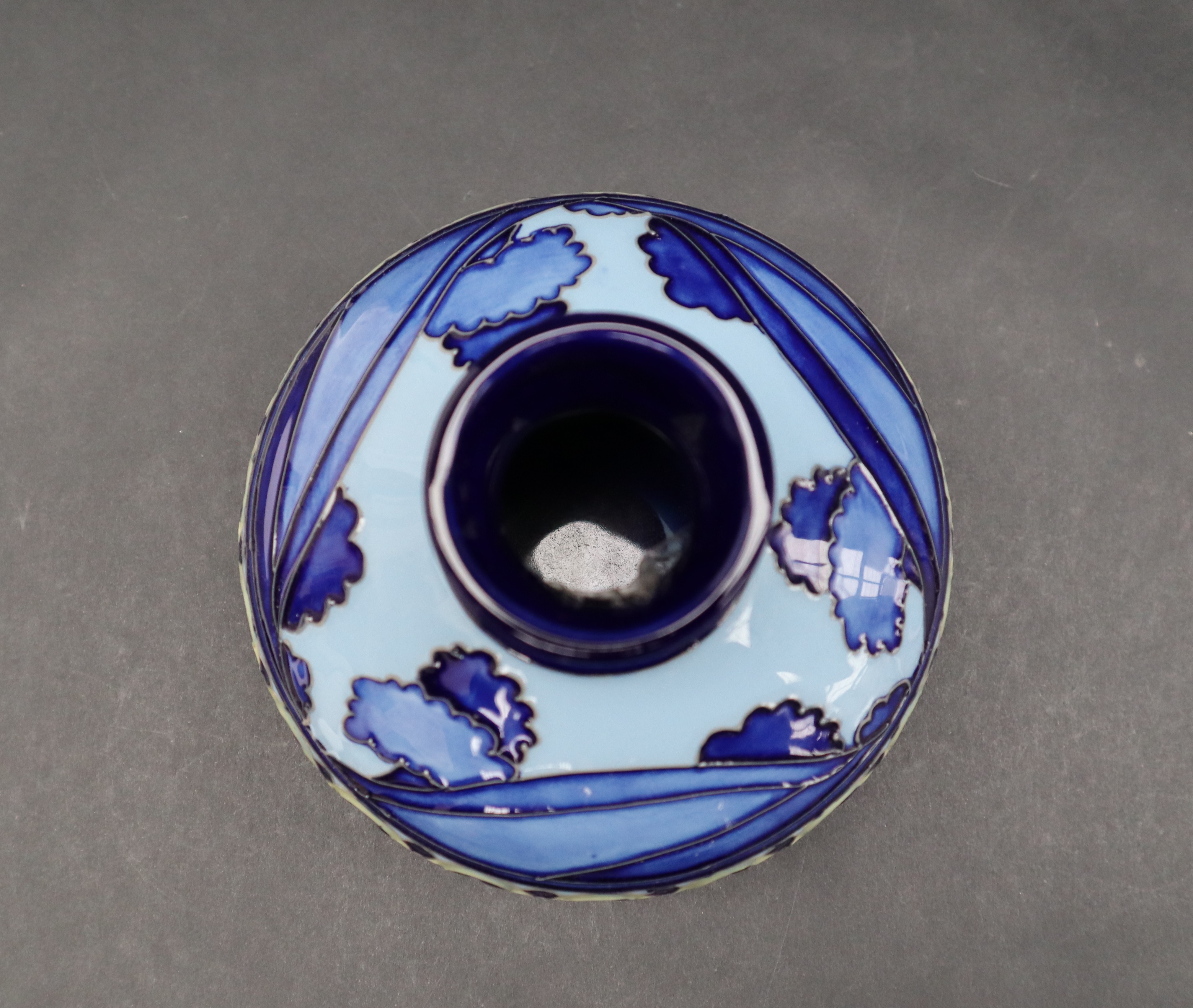 A Moorcroft pottery Second Dawn squat vase with a blue ground, impressed mark, dated 2012, - Image 5 of 6