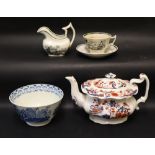 A Llanelly pottery Amherst Japan pattern teapot together with a Swansea blue and white Ladies with