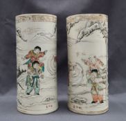 A pair of Japanese satsuma pottery vases of cylindrical form,