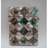 A Victorian mother of pearl and abalone shell card case, f rectangular form with geometric panels,