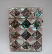 A Victorian mother of pearl and abalone shell card case, f rectangular form with geometric panels,