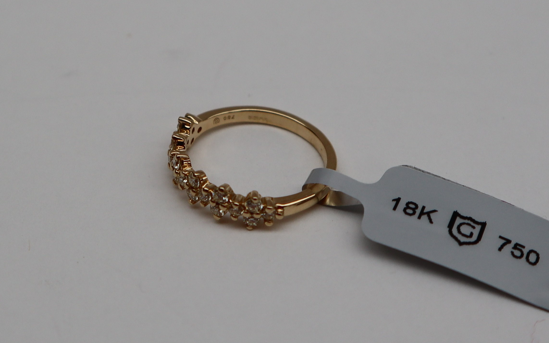 Gemporia - An 18k gold natural yellow diamond Tomas Rae ring, set with nineteen round diamonds, - Image 4 of 5