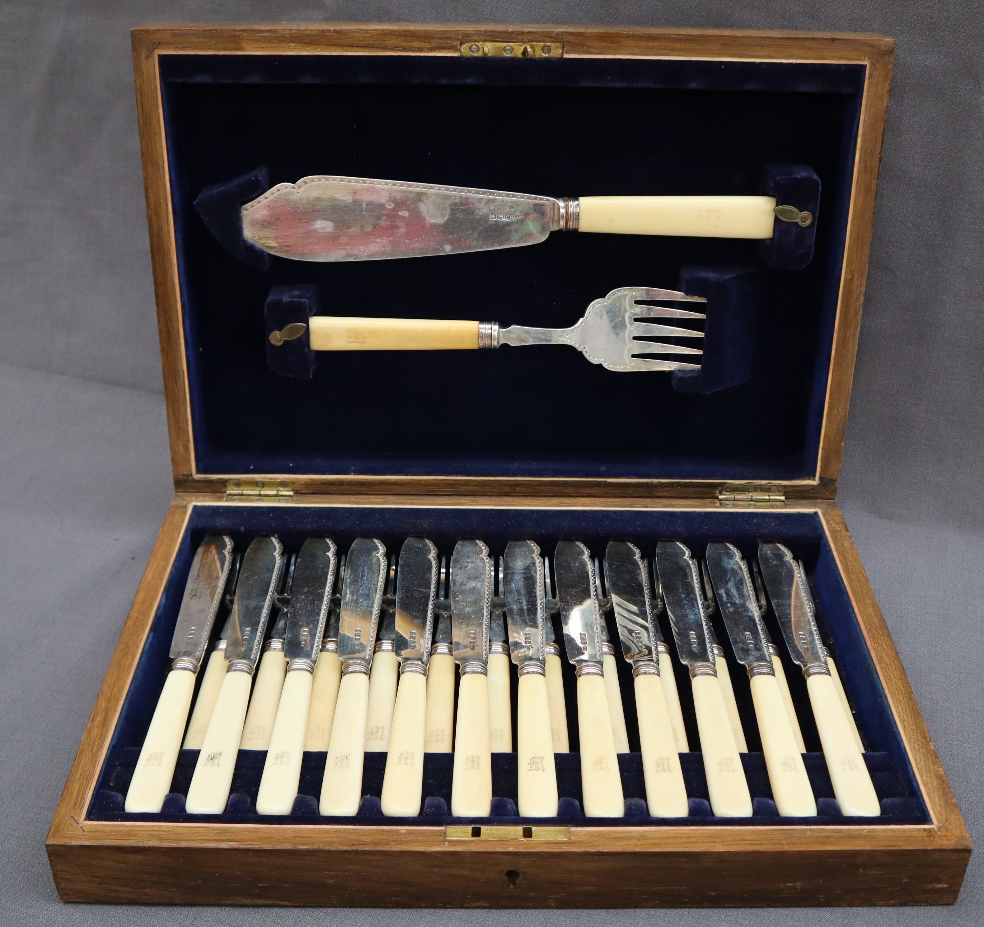 A George V silver bladed fish set, with servers and twelve knives and forks, Sheffield, 1919, - Image 2 of 5