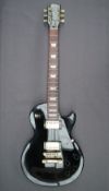 A Gibson Les Paul Studio model electric guitar, in black, Made in the U.S.A. No.