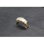 A five stone diamond ring set with baguette cut diamonds, 6mm x 5mm,