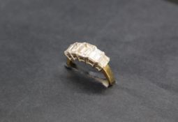 A five stone diamond ring set with baguette cut diamonds, 6mm x 5mm,