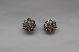 Gemporia - A pair of diamond cluster earrings set with fifty six diamonds to a platinum setting and