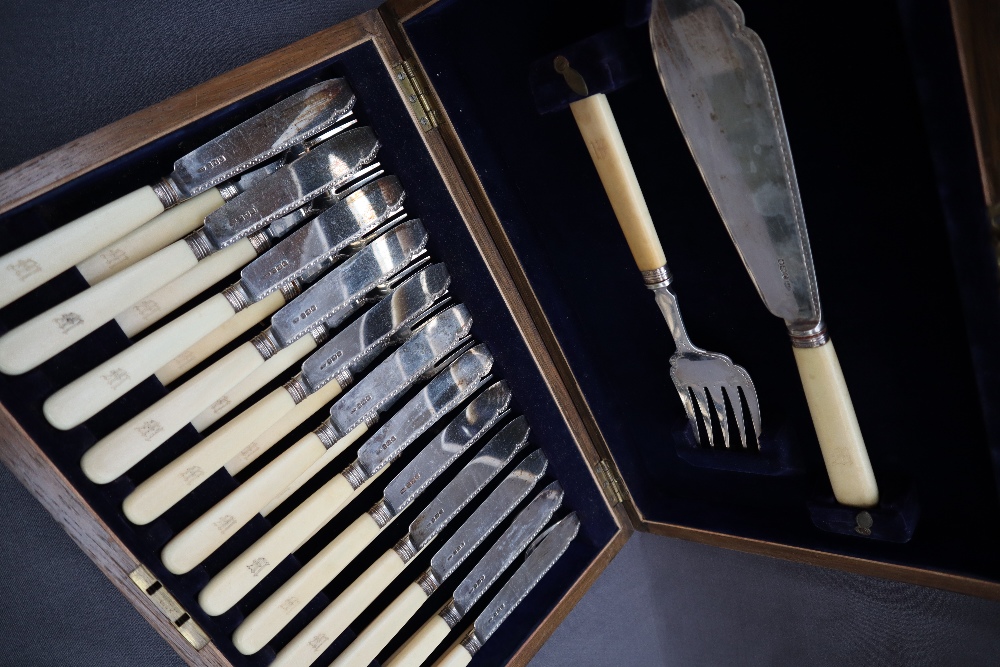 A George V silver bladed fish set, with servers and twelve knives and forks, Sheffield, 1919,