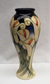 A Moorcroft pottery inverted baluster vase decorated with white calla lilies, signed Kerry Goodwin,