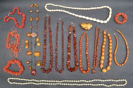 An amber bead necklace with graduated beads,