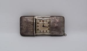 A sterling silver Movado purse watch,