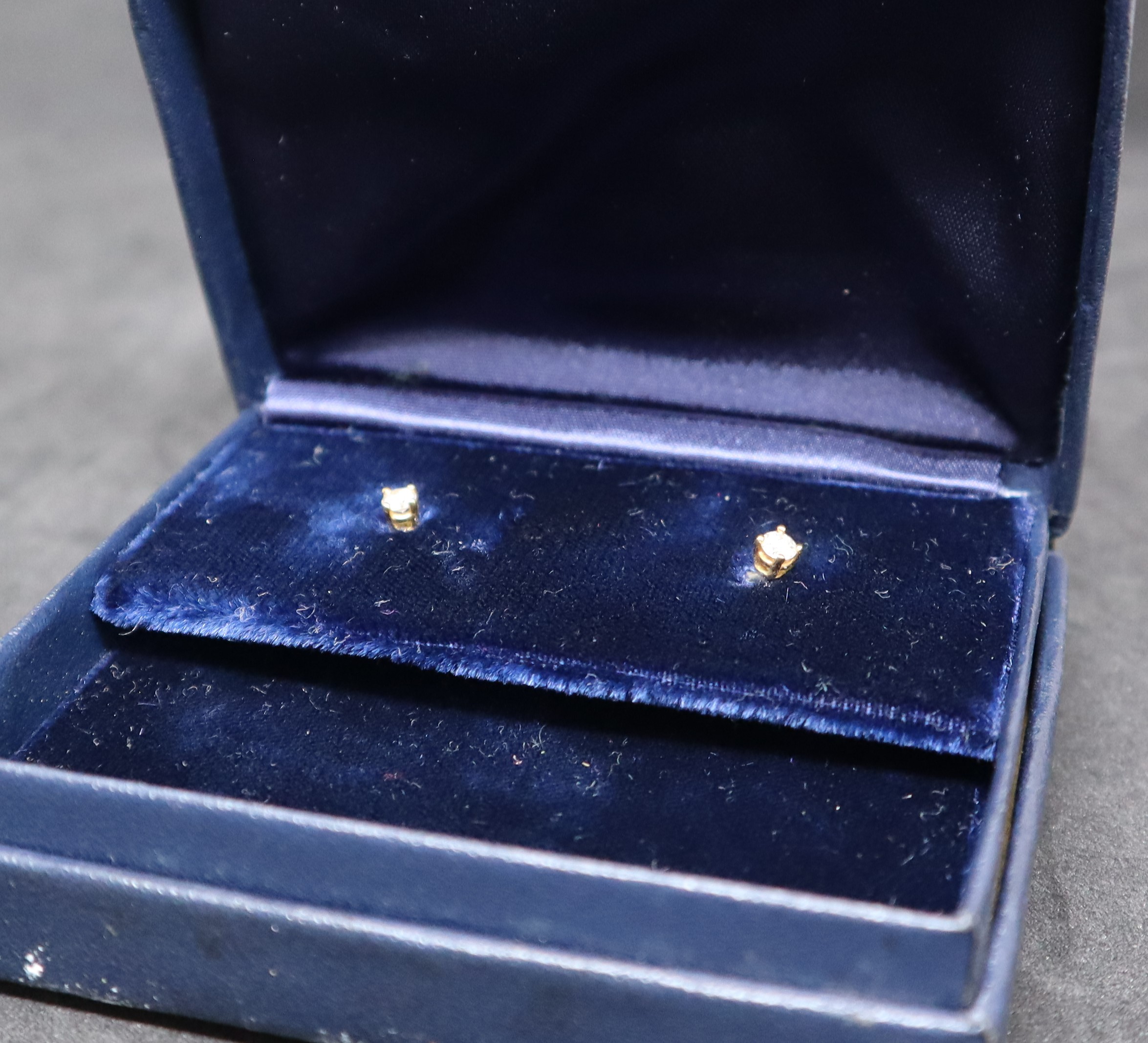 A pair of diamond stud earrings, each approximatel 0. - Image 4 of 4