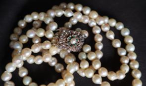 A three strand pearl necklace / choker,