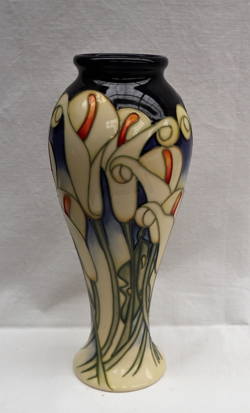 A Moorcroft pottery inverted baluster vase decorated with white calla lilies, signed Kerry Goodwin, - Image 6 of 7