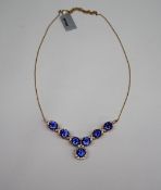 Gemporia - A tanzanite and diamond 18k gold Lorique necklace,