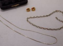 Two 9ct yellow gold shirt studs, together with two 9ct gold necklaces, approximately 5.