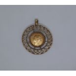 A Victorian young head sovereign dated 1872, in a 9ct gold pendant mount,