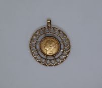 A Victorian young head sovereign dated 1872, in a 9ct gold pendant mount,