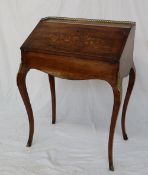 A continental marquetry decorated bureau,