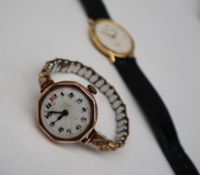 A Lady's 9ct gold wristwatch, the circular dial with Arabic numerals on an expanding bracelet strap,