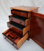 A 19th century oyster veneered collectors cabinet,