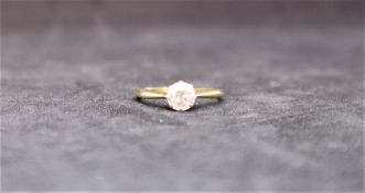 A solitaire diamond ring, the round old cut diamond approximately 0.