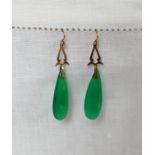 A pair of 9ct gold and jade drop earrings