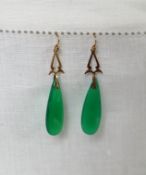 A pair of 9ct gold and jade drop earrings