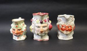 Three assorted 19th century Staffordshire bacchus / satyr faced jugs,