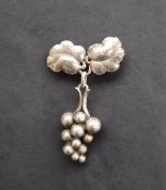 Georg Jensen, a Danish sterling white metal grape brooch, with leaf clasp, 42mm long,