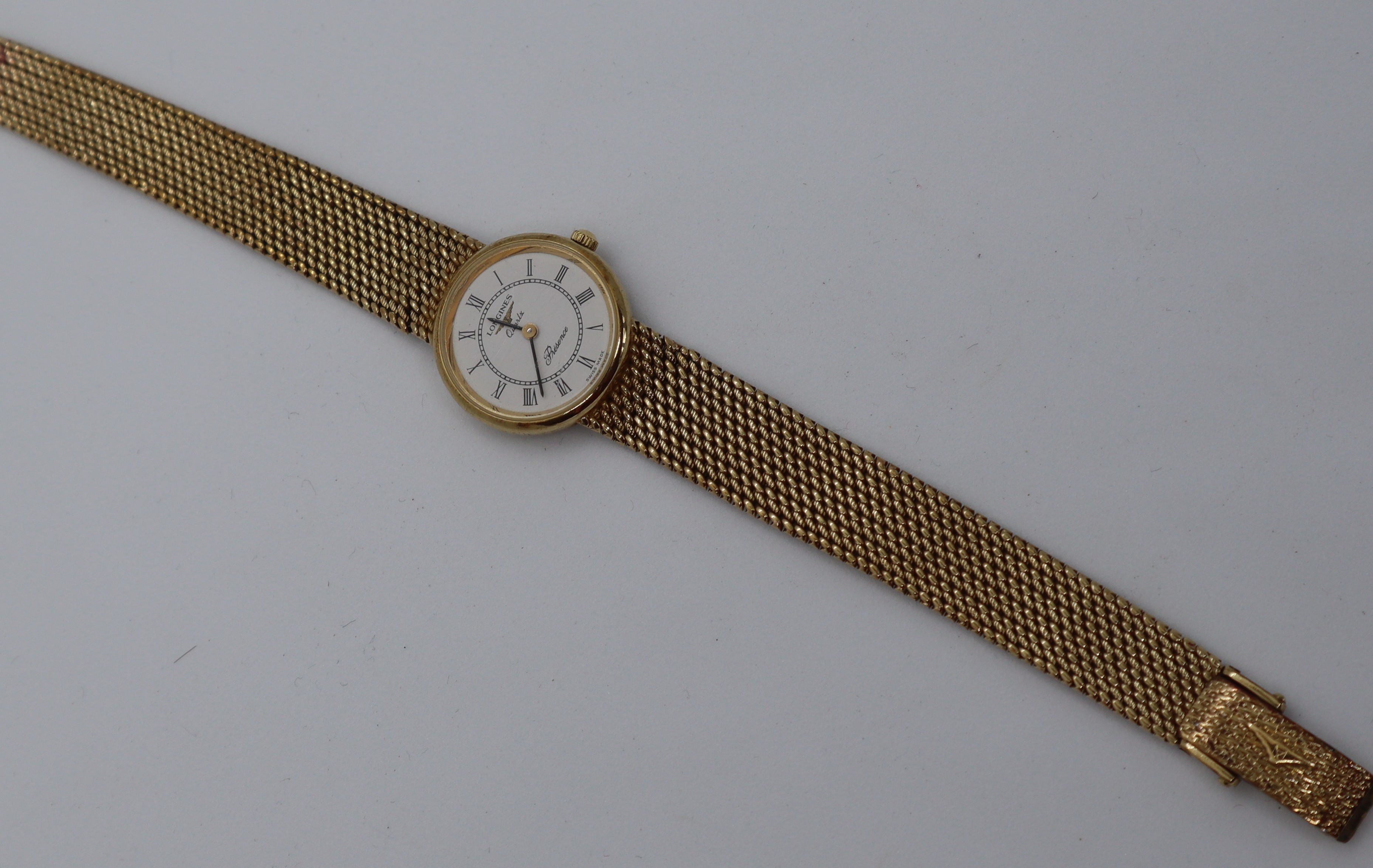 A lady's 9ct yellow gold Longines Presence wristwatch, with a circular dial and Roman numerals, - Image 2 of 5