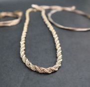 A 9ct yellow and white gold rope twist necklace, 50cm long approximately 34.