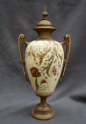 A Royal Worcester porcelain twin handled vase and cover,