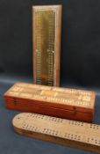 A cribbage board / games box,