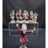 A set of eight continental Augustus Rex Monkey band Figures,