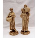 A pair of Royal Worcester figures of water carriers, No.