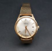 A gentleman's 9ct yellow gold wristwatch, the circular silvered dial with Arabic numerals at 12,