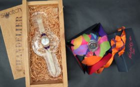 A Swatch Chandelier wristwatch, with original glass stand, wooden box and shavings,