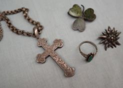 A white metal crucifix, on a white metal chain, together with a silver ring, silver shamrock brooch,