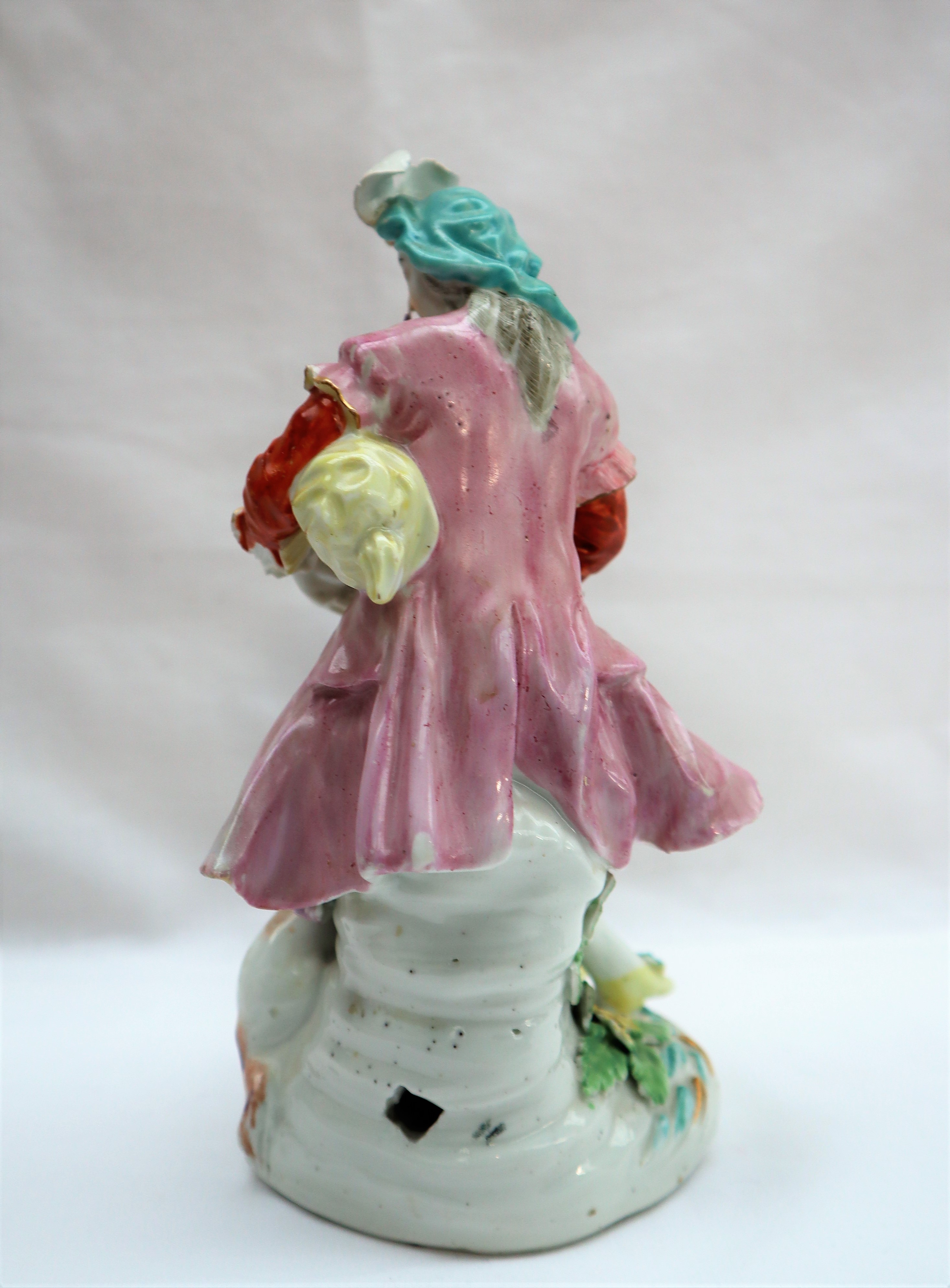 A Derby porcelain figure seated playing bagpipes with a dog at his feet on a circular base, 19. - Image 5 of 8