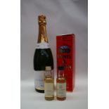 A bottle of House of Commons champagne together with an Innis and Gunn 2004 limited edition bottle