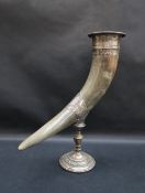 A horn cornucopia mounted with an electroplated top and collar on a vase column and spreading foot,