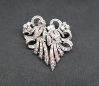 A diamond set double clip brooch,