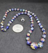 A glass bead necklace,