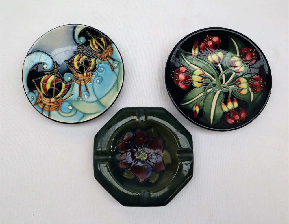 A Moorcroft pottery pin tray of circular form decorated with three ships, impressed marks,