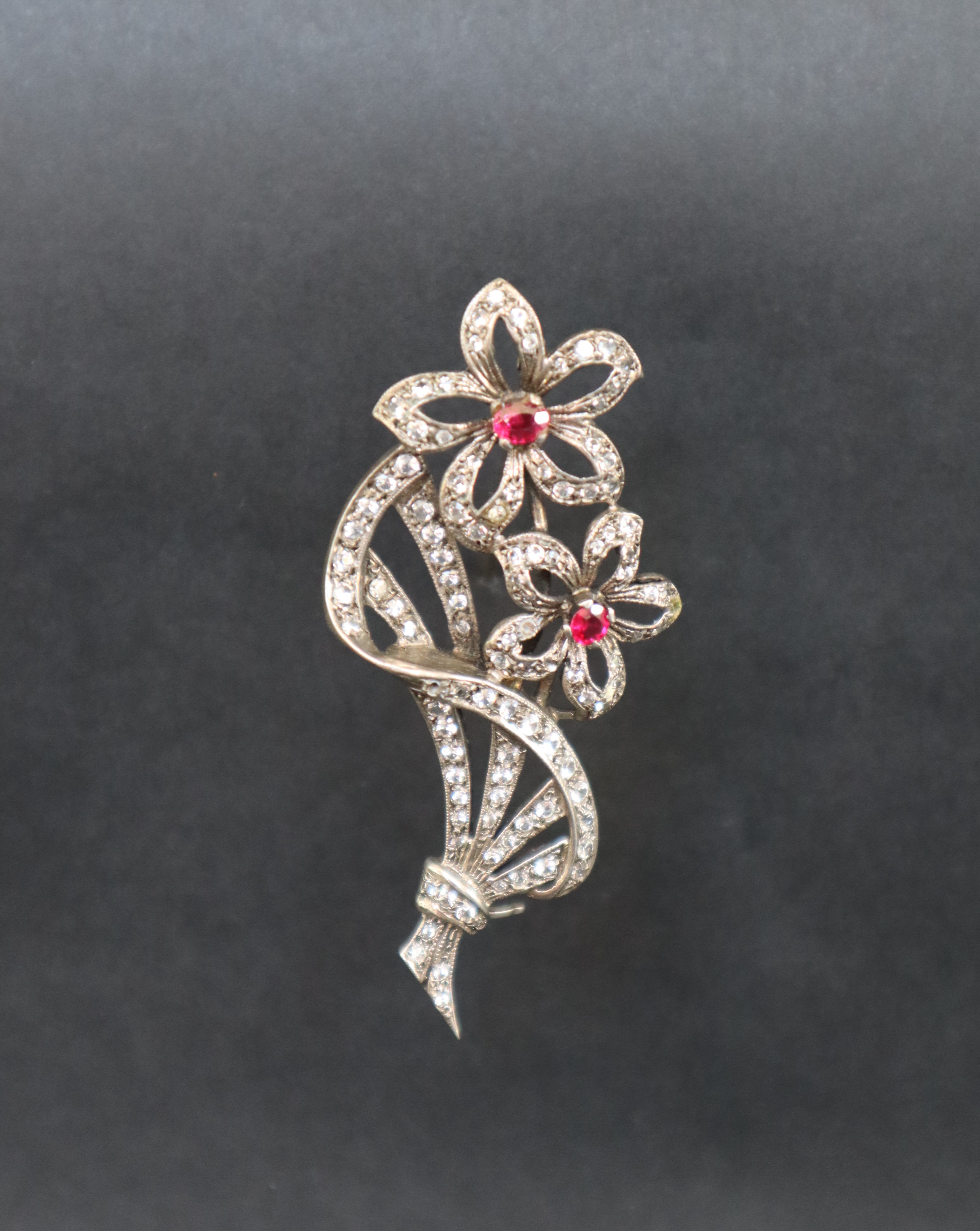 *** Unfortunately this lot has been withdrawn from sale*** A ruby and diamond brooch of floral form,