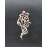 *** Unfortunately this lot has been withdrawn from sale*** A ruby and diamond brooch of floral form,