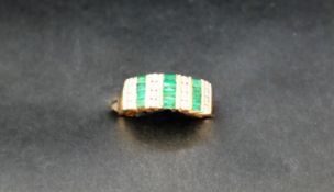 An emerald and diamond ring,